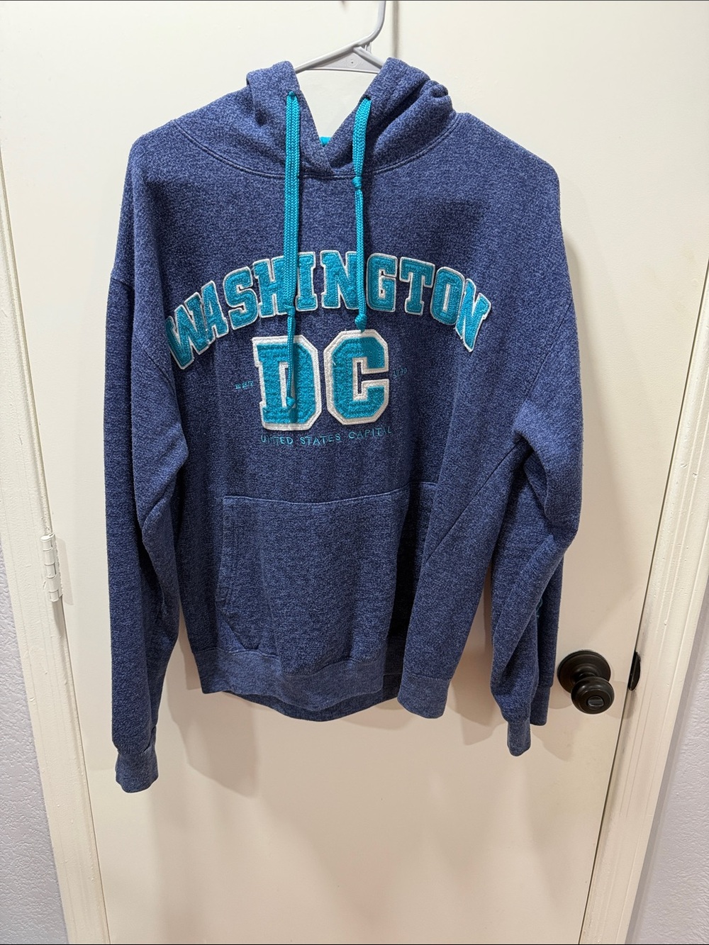 DC Navy Crewneck Hoodie with Teal Lettering and Drawstrings